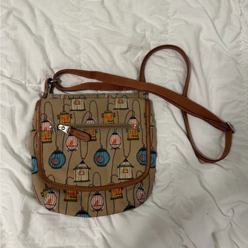 Fossil Tan Crossbody Bag with Colorful Birdcage Design